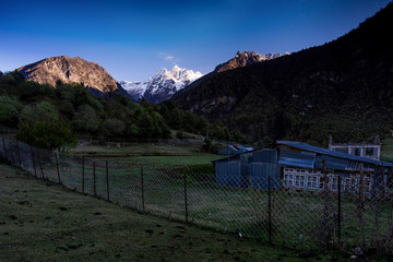 Wall Mural - Snowy mountain sunrise in Tibet, China