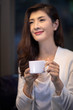 © Blue Jean Images - Businesswoman drinking coffee in caf��