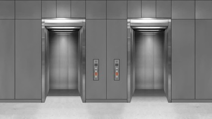 Wall Mural - Sliding steel door elevator open showing lift interior. Office building with grey walls.