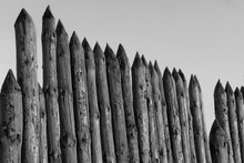 Palisade Of Logs, A Fence Of Wooden Bars.