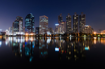 Wall Mural - night light city building skyline of skyscraper in downtown the cityscape landmark in Bangkok Thailand for business and travel center.