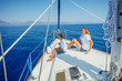 © Max Topchii - Boy with his sister on board of sailing yacht on summer cruise.