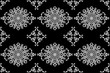 Elegant seamless pattern hand drawn with traditional ornament decoration and mixed with victorian style. Geometry for each side. Black and white background.