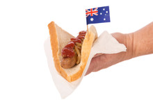 A Traditional Aussie Sausage Sizzle Serve Often At Barbecues And Fund Raisers.