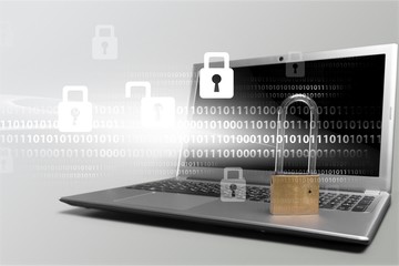 Canvas Print - Lock on the laptop  background,Cyber safety concept