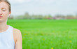 © Dmytro Flisak - Meditation. Young woman doing yoga and listening to relax music. Meditation