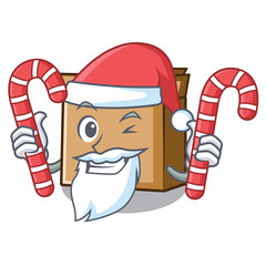 Poster - Santa with candy cartoon cardboard placed next to chair