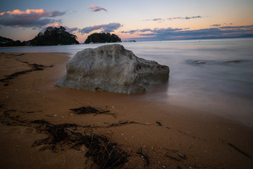 Wall Mural - Kaiteriteri beach landscape long exposure at sunset