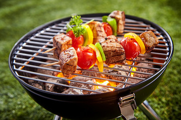 Wall Mural - Assorted grilled meat with vegetable on a grill