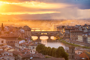 Wall Mural - Beautiful sunset landscape view of Ponte Vecchio bridge in Florence, Italy. Europe