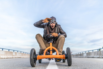 Ride car driver on the road with your tricycle