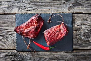 Wall Mural - smoked barbecue pork tenderloin on a stone tray