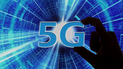 man holding 5g sign with hud in background showing technological advancement