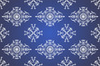 Elegant seamless pattern hand drawn traditional ornament decoration mixed with victorian style. Geometry each side for fashion fabric, knit, textile, batik. Blue background.