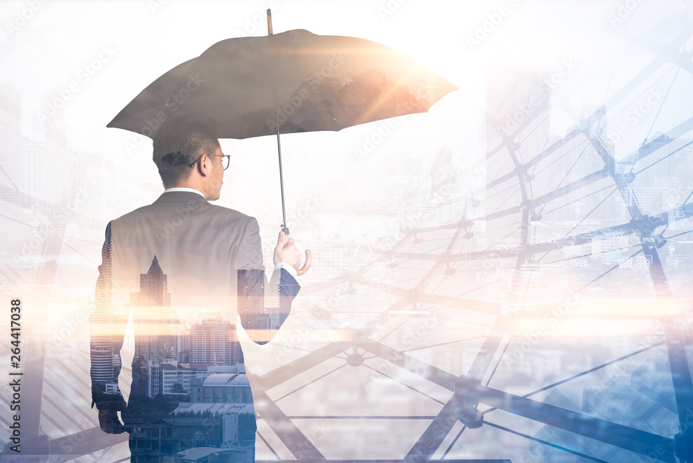 The double exposure image of the Businessmen are spreading umbrella during sunrise overlay with cityscape image. The concept of modern life, business, insurance and protection. - obrazy, fototapety, plakaty 