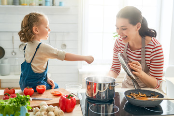 Happy family in the kitchen.