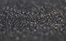 Sandpaper Black Bokeh Light Effect With Soft  Background