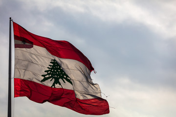 The Lebanese flag flying over Beirut, Lebanon in Spring