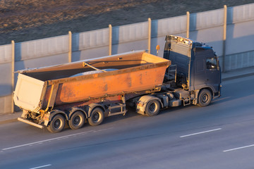 Wall Mural - Truck with a trailer for bulk driving on the highway