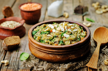 lentils mushroom spinach quinoa with fresh spinach leaves and cashews