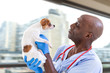 © JPC-PROD - Portrait of a veterinarian doctor holding a chihuahua dog on animals clicnic