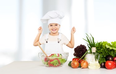 Canvas Print - Portrait of adorable little girl preparing healthy food at kitchen