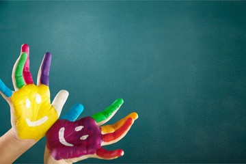 Wall Mural - Hands of  Painted Child. Isolated on white background