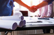 © I Believe I Can Fly - engineer people shaking hands in office, engineering concept, architecture concept, teamwork concept