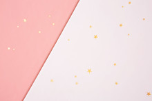 Pink, White. A Two-tone Background With A Golden Star On It.