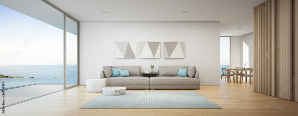 Sea view dining and living room of luxury summer beach house with swimming pool near wooden terrace. Big gray sofa in vacation home or holiday villa. Hotel interior 3d illustration. - obrazy, fototapety, plakaty 