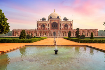 Fototapete - Medieval red sandstone architecture Humayun Tomb complex Delhi at sunset. Humayun Tomb is a UNESCO World Heritage site