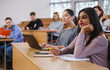 © Nejron Photo - Multinational group of students in an auditorium