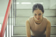 © TeTe Song - Unhappy depressed teenager with face in hands sitting stair at old condo , Sad girl, Cry, drama concept