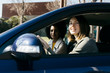 © Westend61 - Portrait of two women driving in a car