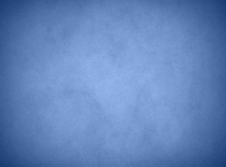 Wall Mural - an elegant, rich blue parchment texture, grunge background, with shadowed border and glowing center.