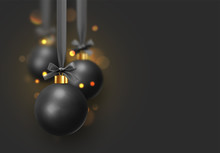 Christmas Background With Black Balls Hanging On Ribbon With Bows And Bright Sparkling Bokeh Lights