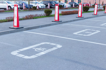 red signs Parking for the disabled at the mall. life of a disabled person in the city