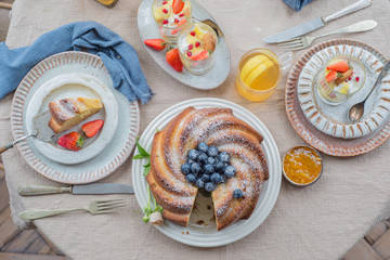 Wall Mural - Pastry table flower arrangement over top