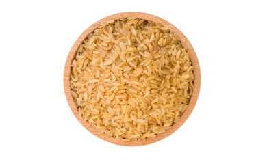 brown rice in wooden bowl isolated on white background. nutrition. food ingredient.top view.