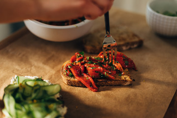 Wall Mural - Roasted red peppers on a toasted bread with parsley and olive oil