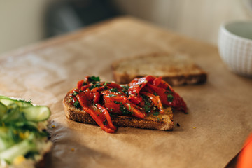 Canvas Print - Roasted red peppers on a toasted bread with parsley and olive oil