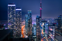 Entire Futuristic City Skyline View Of Downtown Toronto Canada. Modern Buildings, Urban Architecture, Cars Travelling. Construction And Development In A Busy City