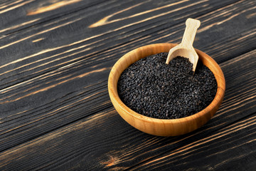 Wall Mural - black sesame seeds in bowl