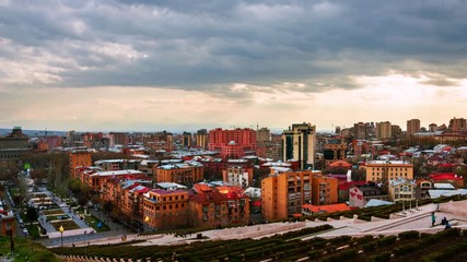 Wall Mural - Yerevan, Armenia. Evening in Yerevan, Armenia from Cascade, Ararat mountain at the background. Time-lapsу of people and car traffic in Yerevan the capital of Armenia, zoom in