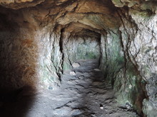 View Inside A Rocky Cave In Fortezza Fortress, The Greek City Of Rethymno. The Hill Of Paleokastro. Cave.