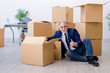 © Elnur - Aged businessman moving to new workplace