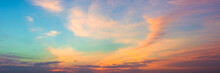 Panoramic Beautiful Colorful Golden Hour Twilight Sky. Beautiful Cloud And Sky Nature Background In Magic Hour. Amazing Colorful Sky And Dramatic Sunset Evening Sky.