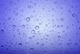 Fototapeta Łazienka - Water droplets texture on blue background