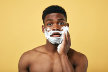 Grooming Concept. Puzzled African Man Going To Shave Beard, Poses Half Naked,daily Routine. Pastime