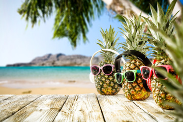 Sticker - Fresh fruits on pineapple and summer time on beach 